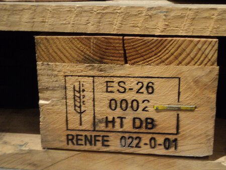 Pallet containing HT (heat treated) and DB (debarked) markings